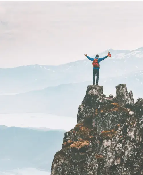 climber-on-mountaintop-min