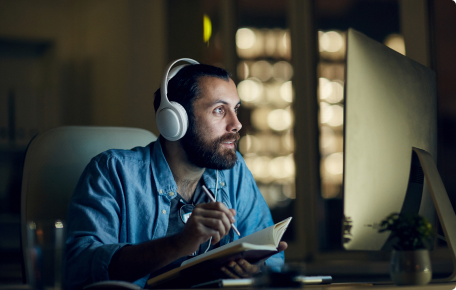 man-video-conferencing-with-cofounder-night